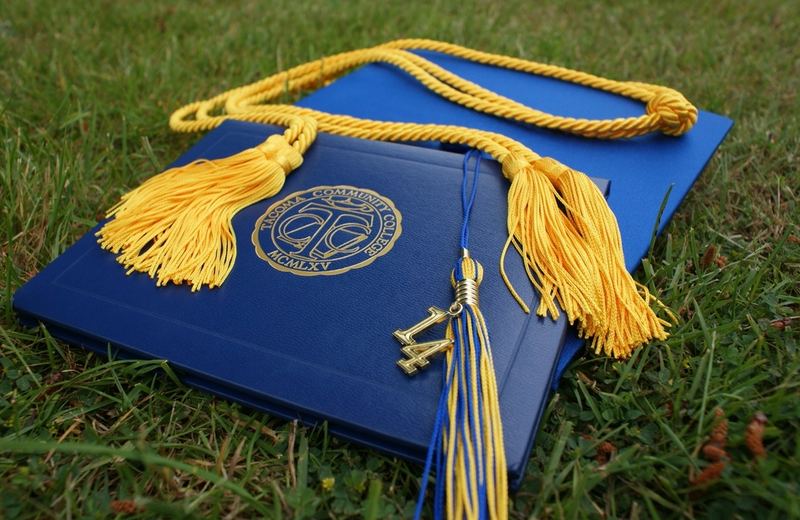 Diploma cover with graduation tassel