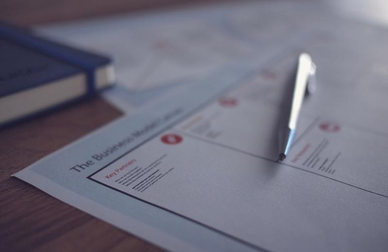 Business document with a pen